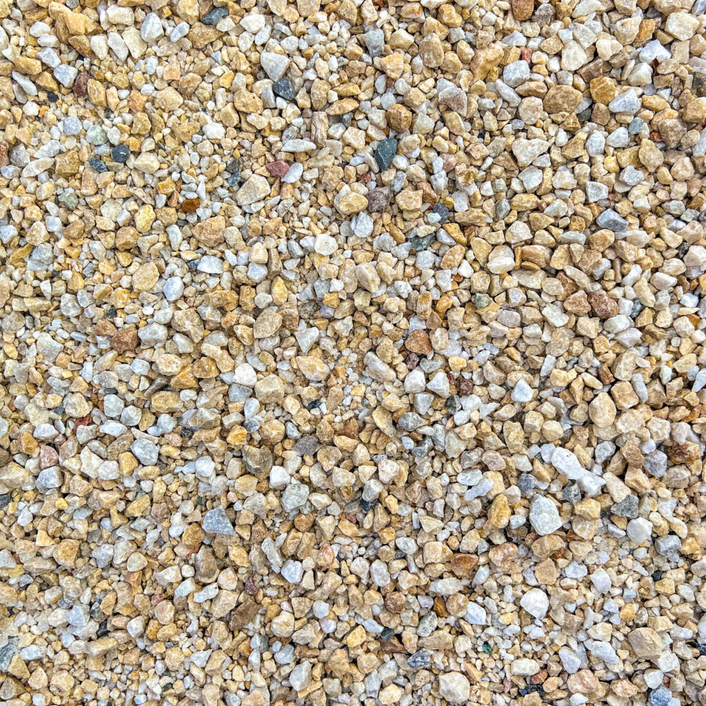 Närbild på Gul Dolomit dekorsten med mjuka gula och grå toner